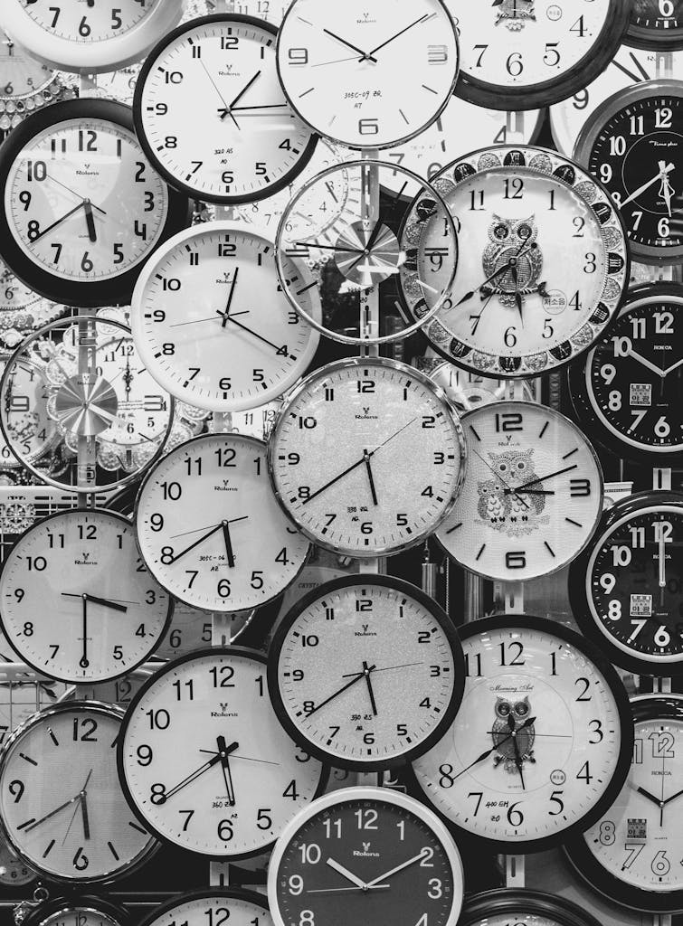 Black And White Photo Of Clocks